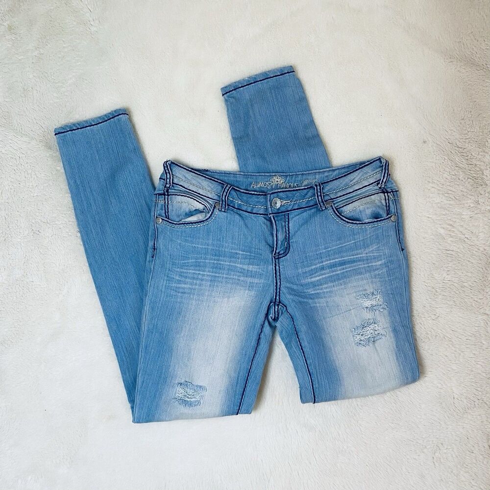 Almost Famous Women’s Mid Rise Slim Skinny Blue Light Wash Stretch Jeans 11